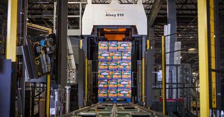 Alvey 910 palletizer with Bee Sweet product