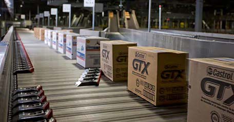 Castrol GTX boxes on a conveyor
